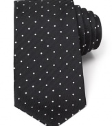A brilliant design, from the strikingly rich color to the ingenious and unique craftsmanship of Turnbull & Asser, this classic tie features a polka dot pattern with a herringbone ground for a dynamic accent to your dress shirting.