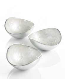 Full of surprises, these handcrafted nut bowls from the Simply Designz collection of serveware and serving dishes feature sleek, polished aluminum lined with scalloped ivory enamel. An elegant set for serving snacks or simply decorating the table. Full of surprises, these handcrafted nut bowls from the Simply Designz collection of serveware and serving dishes feature sleek, polished aluminum lined with scalloped ivory enamel. An elegant set for serving snacks or simply decorating the table.