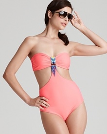 For the style-setting sunbather, Mara Hoffman's beaded one-piece makes a statement. When it's time to leave the beach, this suit hits the tiki bar with denim shorts and bold shades.