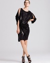 David Meister's unique combination of sequins and jersey results in a decadent yet wearable look. Add a hint of gold and you're ready for the night ahead.