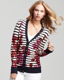 Classic nautical stripes mix with a pretty petal print on this luxe Tory Burch cardigan, finished with gold-toned logo buttons. Classic nautical stripes mix with a pretty petal print on this luxe Tory Burch cardigan, finished with gold-toned logo buttons.