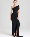 Make a grand entrance in this breathtaking Donna Karan New York one-shoulder gown, flaunting gorgeous ruching detail, and ensure your special occasion is a sweeping style success.