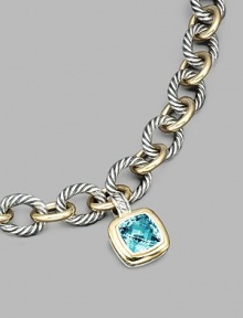 From the Albion Collection. A brilliant blue topaz, richly faceted, surrounded by 18k gold and set in sterling silver. Blue topaz 18k yellow gold and sterling silver About ½ square Hinged clip clasp Made in USA Please note: Necklace sold separately. From the Albion Collection. A brilliant blue topaz, richly faceted, surrounded by 18k gold and set in sterling silver. Blue topaz 18k yellow gold and sterling silver About ½ square Hinged clip clasp Made in USA Please note: Necklace sold separately.