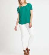 Mulberry silk makes this blouse luxurious. The perfectly relaxed fit makes it a must-have.Round neckButton-tab detail on short sleevesBack zipperAbout 24 from shoulder to hemSilkHand washImported Model shown is 5'9 (175cm) wearing US size Small. 