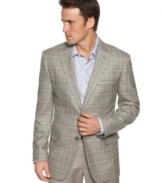 Finish off your dress look with this handsome plaid blazer from Tasso Elba.