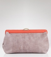 The color block trend goes compact with this snake-embossed clutch from Botkier. Tucked under a little white dress, this bag is ready to dance 'til dawn.