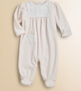 A beautiful long-sleeved footed coverall in plush velour is highlighted with a pretty pintucked bib.CrewneckLong puff sleevesBack buttonsFront patch pocketBottom snapsCottonMachine washImported Please note: Number of buttons/snaps may vary depending on size ordered. 