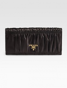 Dramatic pleating in supple lambskin opens up to ten credit card slots and four billfold compartments.Goldtone logo detail Snap closure Inside zipper Lambskin lining 7½W X 3½H X ½D Made in Italy Dramatic pleating in supple lambskin opens up to ten credit card slots and four billfold compartments.Goldtone logo detail Snap closure Inside zipper Lambskin lining 7½W X 3½H X ½D Made in Italy
