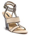 In pretty linen with delicate ankle straps, Rachel Zoe's wedges are femininity defined.