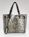 Sam Edelman's roomy tote takes on the day with an edgy textured print and industrial-strength hardware.