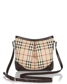 Go preppy chic with this checked crossbody bag from Burberry. Go preppy chic with this checked crossbody bag from Burberry.
