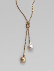 A lariat of rope-textured 18k gold vermeil with a love knot center and lustrous white and champagne baroque organic pearls dangling from each end. 14mm baroque white and champagne man-made pearls 18k gold vermeil Length adjusts from about 18 to 24 Made in Spain A lariat of rope-textured 18k gold vermeil with a love knot center and lustrous white and champagne baroque organic pearls dangling from each end. 14mm baroque white and champagne man-made pearls 18k gold vermeil Length adjusts from about 18 to 24 Made in Spain