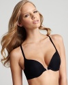 A multi-convertible bra with removable padding and silver clasp front for a versatile style.