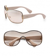 A stylish shield design in acetate and metal. Available in black with grey gradient lens or ivory and gold with beige silver mirror lens.Logo temples100% UV protectionMade in Italy 