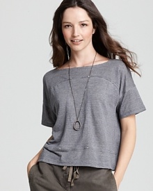 Silver-toned metal beads punctuate this flowing, striped Eileen Fisher linen top for a modern take on a relaxed classic.