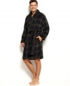 Wrap yourself in this luxurious plush plaid robe by Club Room and indulge in blissful comfort.