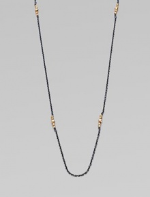 A simply chic design with 14k gold beads clusters on oxidized sterling silver link chain. 14k gold beadsOxidized sterling silverLength, about 40Spring ring closureMade in USA A simply chic design with 14k gold beads clusters on oxidized sterling silver link chain. 14k gold beadsOxidized sterling silverLength, about 40Spring ring closureMade in USA
