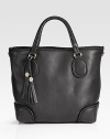 Leather tote bag with braided leather handles, tassels and metal G ornaments.Double top handles, 5¾ drop Inner buckle-lock closure Protective metal feet One inside zip pocket Two inside open pockets Fully lined 16W X 12½H X 5D Made in Italy
