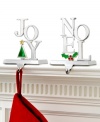 Send a message with the Joy and Noel stocking holders from Holiday Lane. Polished silvertone metal with colorful enamel accents will be a source of cheer from one Christmas to the next.