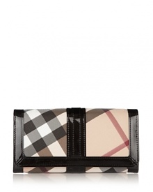 A chic wallet from Burberry in the house's iconic check. A chic wallet from Burberry in the house's iconic check.