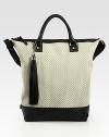 A woven print highlights this slouchy leather carryall, finished dual straps and contrast trim.Double top handles, 5 dropAdjustable shoulder strap, 9-10 dropTop zip closureOne inside zip pocketThree inside open pocketsCotton lining16½W X 16½H X 6¾DImported