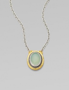 From the Gauntlet Collection. A smooth oval of pastel aqua chalcedony is elegantly framed in granulated sterling silver and hammered 24k gold, on a silver chain.Aqua chalcedonySterling silver and 24k yellow goldChain length, about 18Pendant length, about ¾Imported From the Gauntlet Collection. A smooth oval of pastel aqua chalcedony is elegantly framed in granulated sterling silver and hammered 24k gold, on a silver chain.Aqua chalcedonySterling silver and 24k yellow goldChain length, about 18Pendant length, about ¾Imported