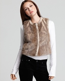 Rock the glamour trend in this Juicy Couture faux fur vest--a luxe layer for your favorite fall-worthy pieces