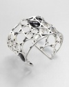 From the Regitze Collection. A striking, sculptural open cuff formed of cutout circles of gleaming sterling silver, dotted with discs of rich black agate.Black agateSterling silverDiameter, about 2¼Width, about 1¾Imported