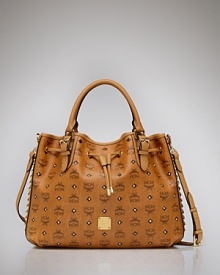 Rock a retro shoulder with MCM's gold studded bag. The hardware-clad carryall is a designer-approved investment in classic style, with an edge. Rock a retro shoulder with MCM's gold studded bag. The hardware-clad carryall is a designer-approved investment in classic style, with an edge.