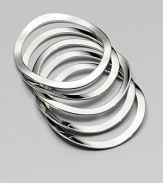 Narrow, rounded square bangles make a sleek and versatile piece that's perfect for stacking. BrassDiameter, about 2½Slip-on styleImported 