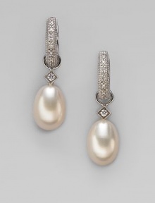 Lustrous white freshwater pearls, with dazzling diamond accents, are ready to hang from your favorite hoops. Diamonds, 0.03 tcw White freshwater pearls 18k white gold Drop, about ¾ Spring clip clasp Imported Please note: Earrings sold separately.