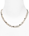 Judith Jack's pearl collar necklace with cubic zirconia stations sparkles with timeless charm. Wear this stunning, vintage-inspired adornment for an instant wow factor.