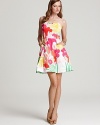 A flirty floral print and ruffle trim lend romantic appeal to this strapless dress from Lilly Pulitzer.