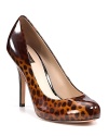 Leopard goes ladylike in shiny patent leather with an almond toe. Pair Joan & David's shapely pumps with a seriously urvy LBD.