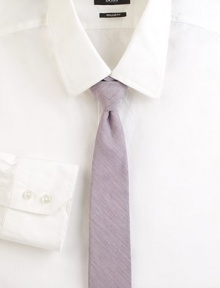 Streamlined, slim plaid design adds a modern touch to your classic wardrobe essentials.CottonDry cleanMade in USA Streamlined, slim plaid design adds a modern touch to your classic wardrobe essentials.CottonDry cleanMade in USA