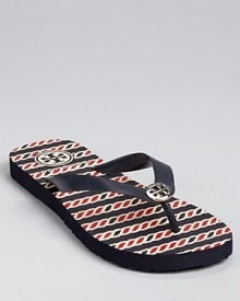 Tory Burch does flip flops, reinvented with a vibrant patterned footbed and a nautical vibe.