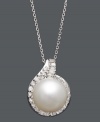 The perfect combination of polish and shine. This luxurious pendant highlights a cultured South Sea pearl (12-13 mm) surrounded by a halo of sparkling round-cut diamonds (1/2 ct. t.w.). Setting and chain crafted in 14k white gold. Approximate length: 18 inches. Approximate drop: 1 inch.