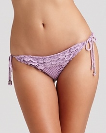 Nanette Lepore's crochet bikini bottom is a must for the bohemian beauty. Complete the hippie chic look by pairing this girlie suit with flat sandals and a pair of round frames. Nanette Lepore's crochet bikini bottom is a must for the bohemian beauty. Complete the hippie chic look by pairing this girlie suit with flat sandals and a pair of round frames.