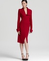 Structured doubleknit jersey shapes this directional Donna Karan New York dress, designed with flattering ruching and asymmetric details for a modern spin on boardroom style.