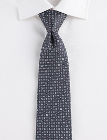 Geometric prints and the signature gancini symbol adorns this work wardrobe classic, in a vibrant, silk design that will lighten the mood of your serious suiting.SilkDry cleanMade in Italy Geometric prints and the signature gancini symbol adorns this work wardrobe classic, in a vibrant, silk design that will lighten the mood of your serious suiting.SilkDry cleanMade in Italy