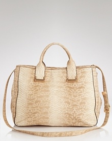 Rachel Zoe's leather tote proves practical accessories have a place in the most discriminating closets. In embossed leather with polished details, it's positively major. Rachel Zoe's leather tote proves practical accessories have a place in the most discriminating closets. In embossed leather with polished details, it's positively major.