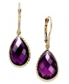 Take your look to the next level with the right amount of color. Pear-cut amethyst (10 ct. t.w.) adds the sparkle to these shining 14k gold earrings with diamond accents. Approximate drop: 1-1/4 inches.