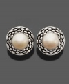 Luminous cultured freshwater pearls (10-1/2-11 mm) shine at the center of these braided sterling silver button earrings by Fresh by Honora. Approximate diameter: 3/4 inch.