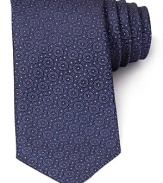 Show your affection for modern luxury with this exquisite medallion print tie. Each circle surrounds a band of eight tiny hearts on lavish Italian silk. From Canali.
