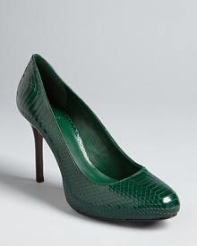 In a bold jewel tone and on-trend exotic print, Tory Burch's Marianne pumps are just the wake-up call your wardrobe needs. In a bold jewel tone and on-trend exotic print, Tory Burch's Marianne pumps are just the wake-up call your wardrobe needs.