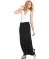 Rendered in a silky, super-soft stretch knit, a classic maxi skirt from MICHAEL Michael Kors is the epitome of effortless chic. Pair it with anything in your closet for a flawless, pulled-together look.