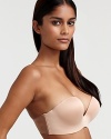 A sleek backless push-up bra with padded underwire cups and tape at sides for ultimate support.