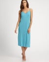 Soft, elegant and eye-catching with lace trim along the neckline.Adjustable shoulder straps About 46 from shoulder to hem 65% modal/35% polyester; machine wash Imported