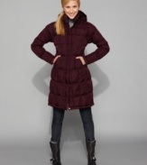 Get warm this winter in the versatile Metropolis coat by The North Face. A snap-off drawstring hood and a down-filled interior keep you toasty!