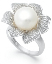 A true beauty. A cultured freshwater pearl (10 mm) and sparkling round-cut diamonds (1/10 ct. t.w.) adorn this exquisite flower ring. Set in sterling silver. Approximate width: 1 inch. Size 7. A true beauty. A cultured freshwater pearl (10 mm) and sparkling round-cut diamonds (1/10 ct. t.w.) adorn this exquisite flower ring. Set in sterling silver. Approximate width: 1 inch. Size 7.